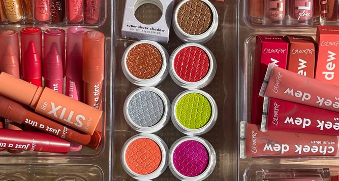 alt="colourpop beauty brand colourful eyeshadows and makeup products"