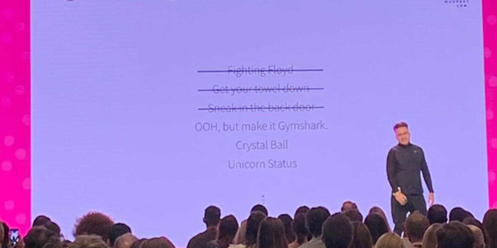 gymshark marketing, on stage at MAD//Fest london, old truman brewery, giving a speech on brand growth